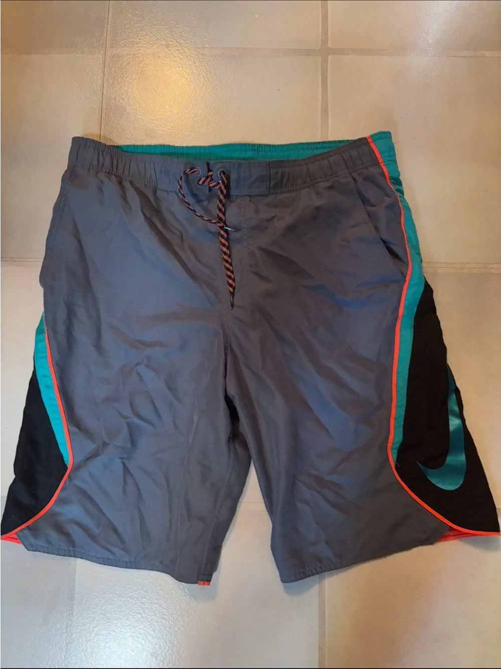 Nike Men’s Gray Swim Board Shorts with Teal Panels and Orange Trim